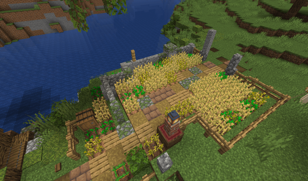 A small farm or garden flanks a path leading to the tree house.