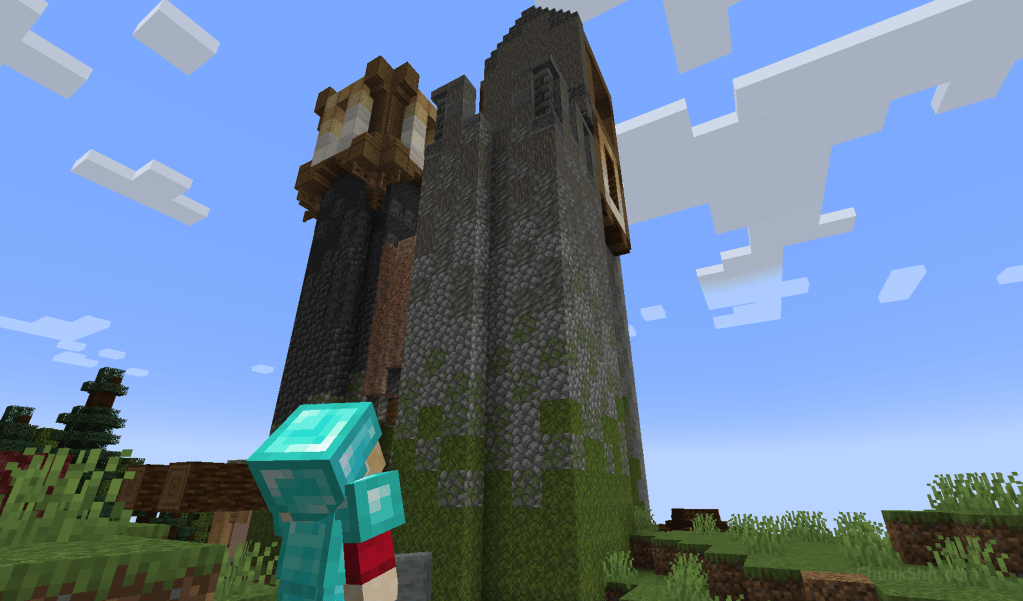later screenshot of the tower adjacent the keep with non-butrussed and intricately decorated battlements.