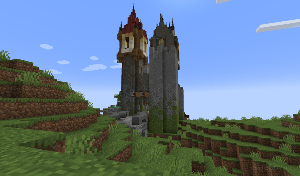 Screenshot of completed castle; tower adjacent the keep with non-butrussed and undecorated battlements.