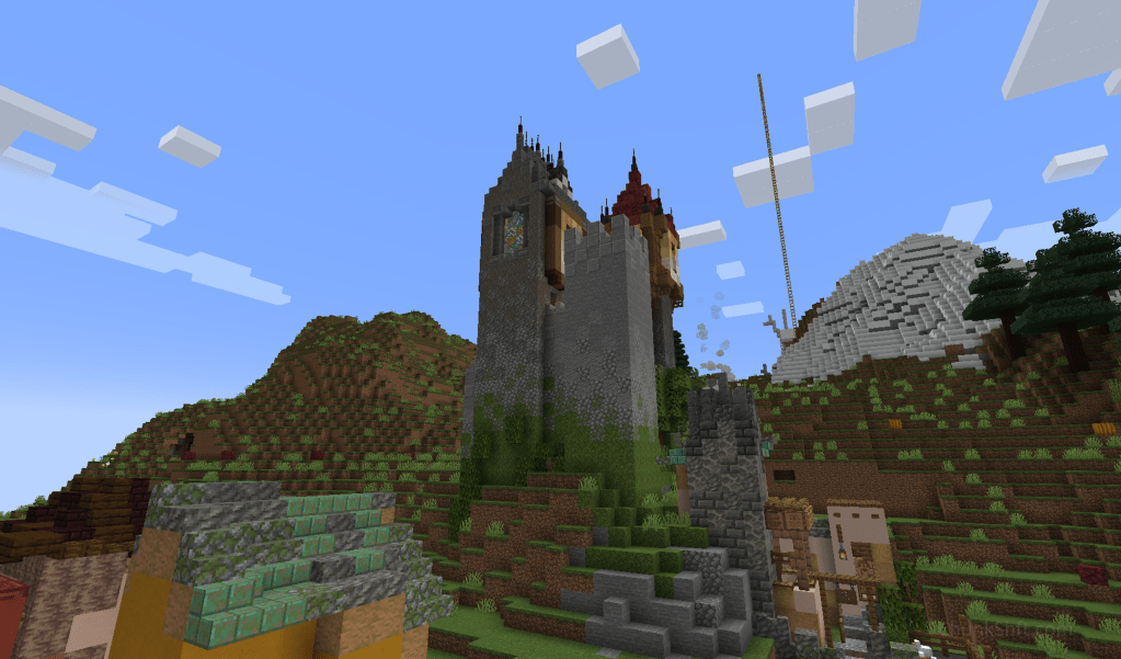 View of the completed 1 chunk castle from over the village.