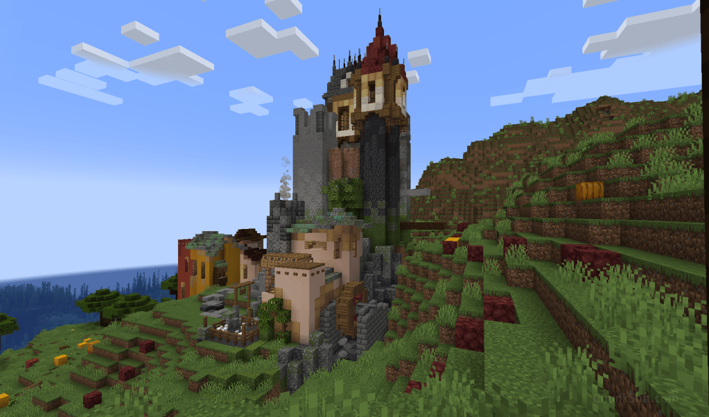 Screenshot of castle with bakery in front. Block pallets include a stone tower, a red wall and a deepslate tower.