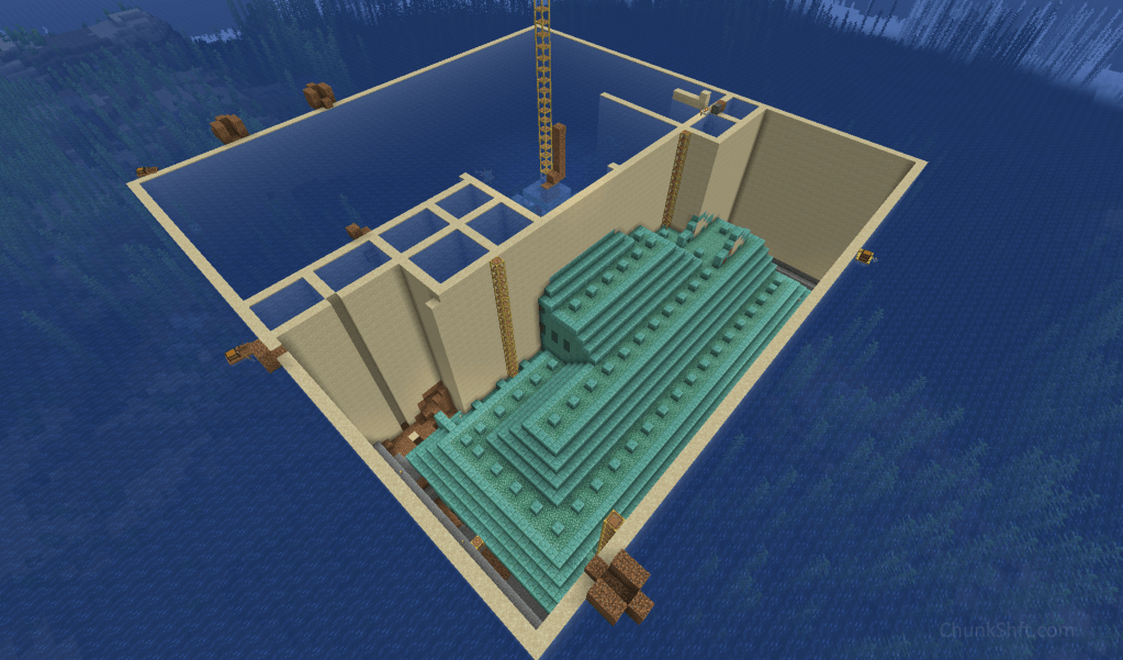 Ocean monument partially drained. Sand perimeter tight to monument and sand placed in a few squares within remaining area to be drained. 