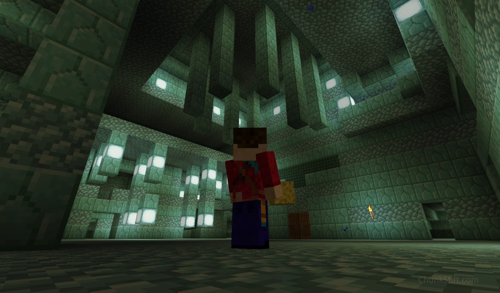 The player stands near the centre of an ocean monument. The interior has been partially removed allowing view into the upper chamber.