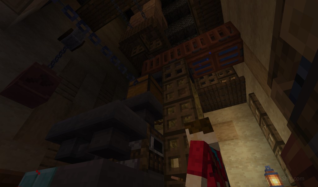 Player stands in front of the smoker. The interior is dark and not well finished. 