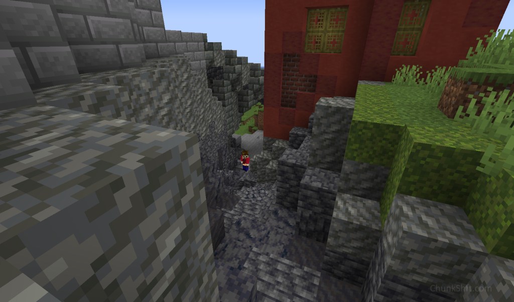 The player stands at the bottom of a shallow ravine lined with tuff, deepslate, basalt and mud. The walls of the day 1500 build drop into part of the ravine. 