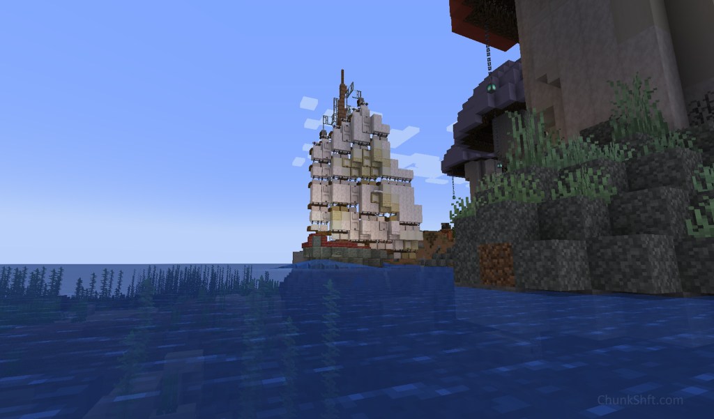 A view of the junk "sailing" towards the shot. The wake is visible and the iconic junk sail dominates the image.