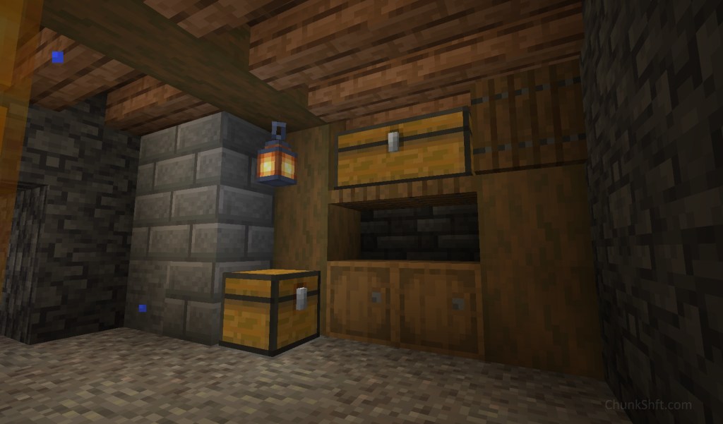 Water drips from overhead in a dingy basement. A single lantern lights this small space. A double chest sits on a shelf above 2 barrels and a single trapped chest sits on the floor. 