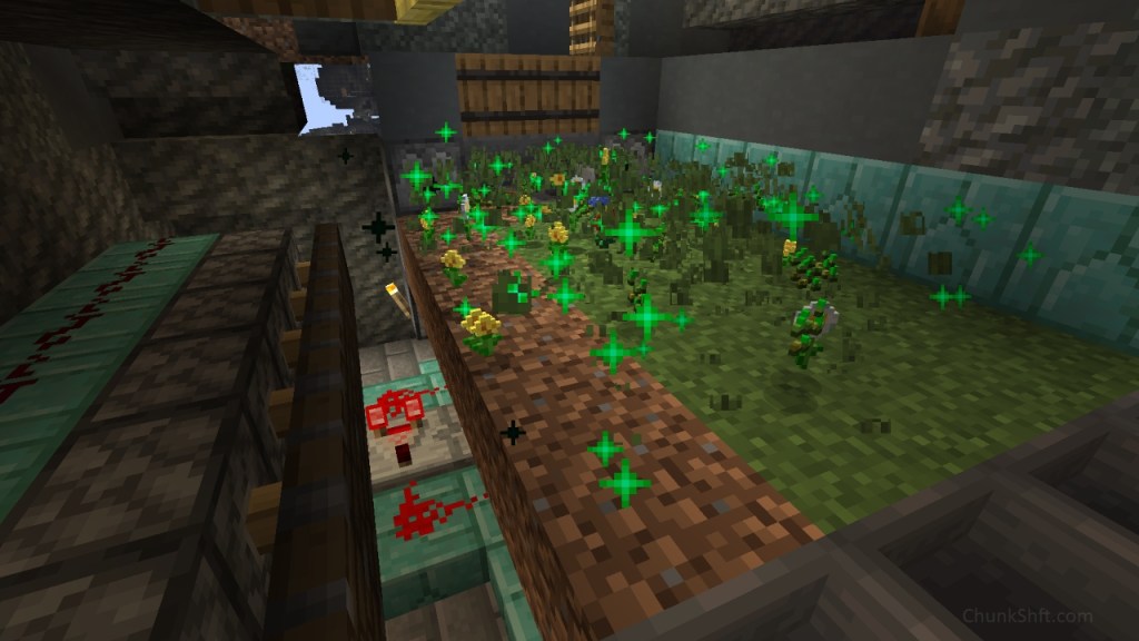 Particles light up a rectangular area of dirt and grass. Flowers lay atop the area. Pistons are retracted on one long side exposing redstone below. Hoppers are along the short side of the farm near the reader.