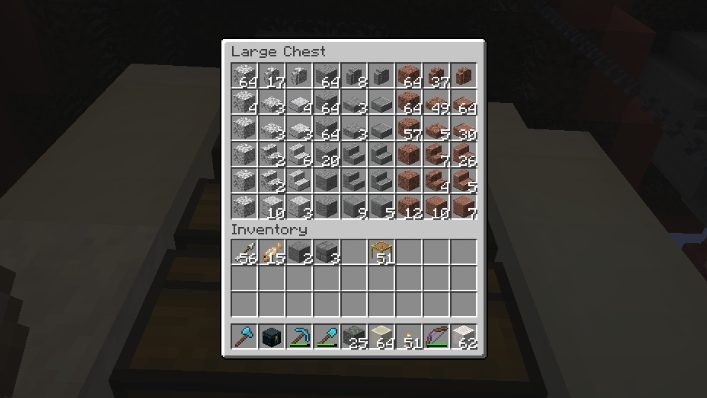 A double chest is opened displaying its contents. First a column of diorite, next column diorite wall, 2 slabs, 2 stairs and 1 polished block. This is repeated in the next column and the pattern repeats for andesite and granite.