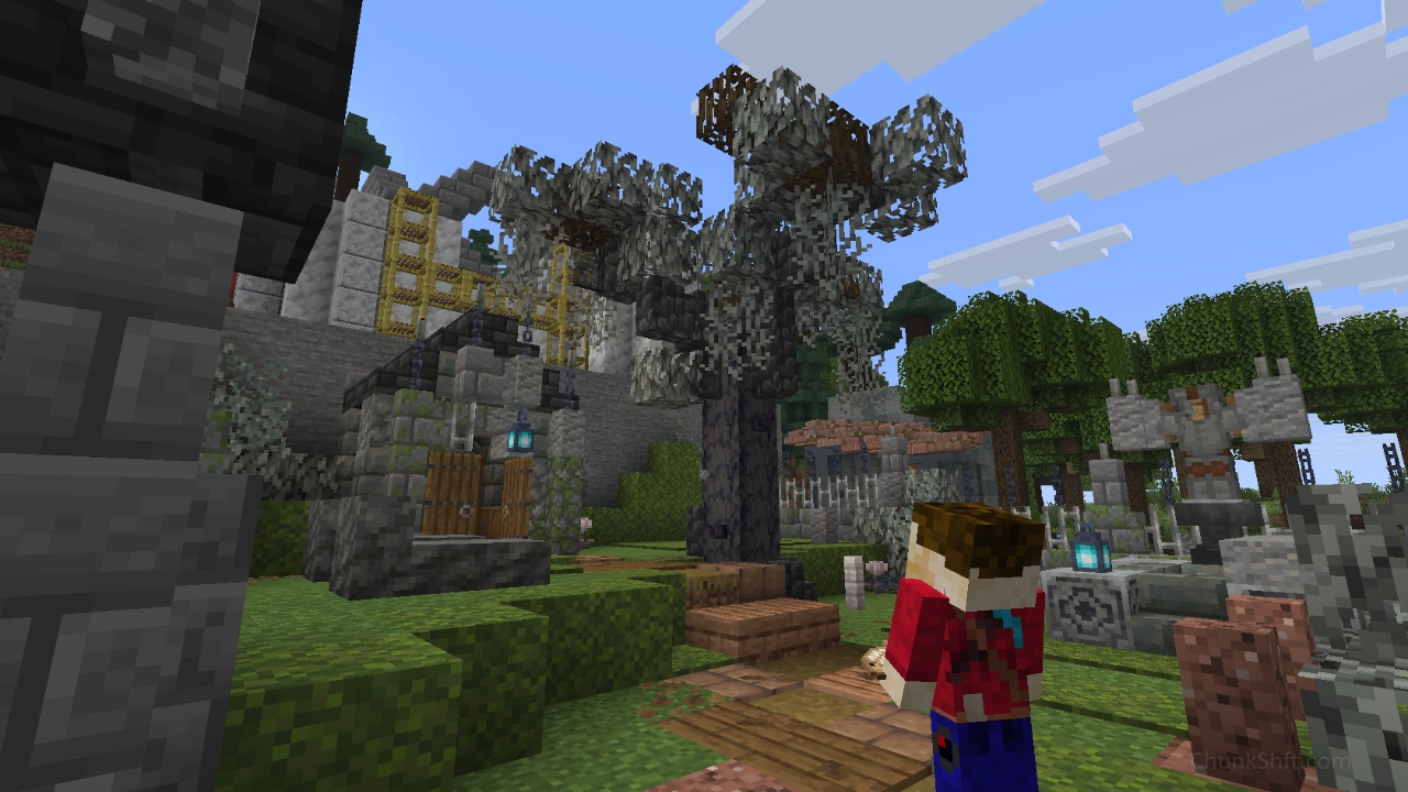 The player looks at a tree in the centre of the image. The trunk and limbs are dark grey, almost black. leaves are pale with hanging moss.